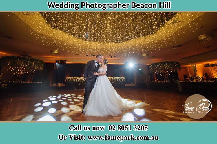 Photo of the Bride and the Groom kissing at the dance floor Beacon Hill NSW 2100