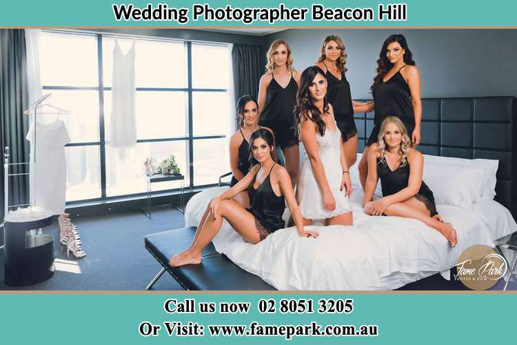 Photo of the Bride and the bridesmaids wearing lingerie on the bed Beacon Hill NSW 2100