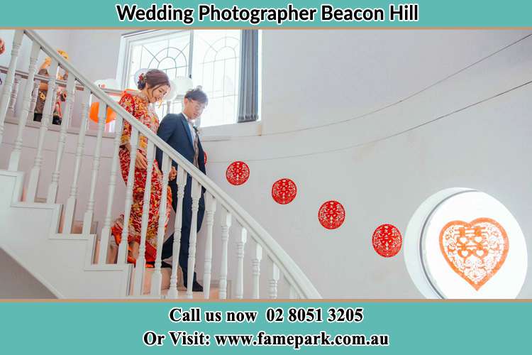 Photo of the Bride and the Groom going down the stair Beacon Hill NSW 2100