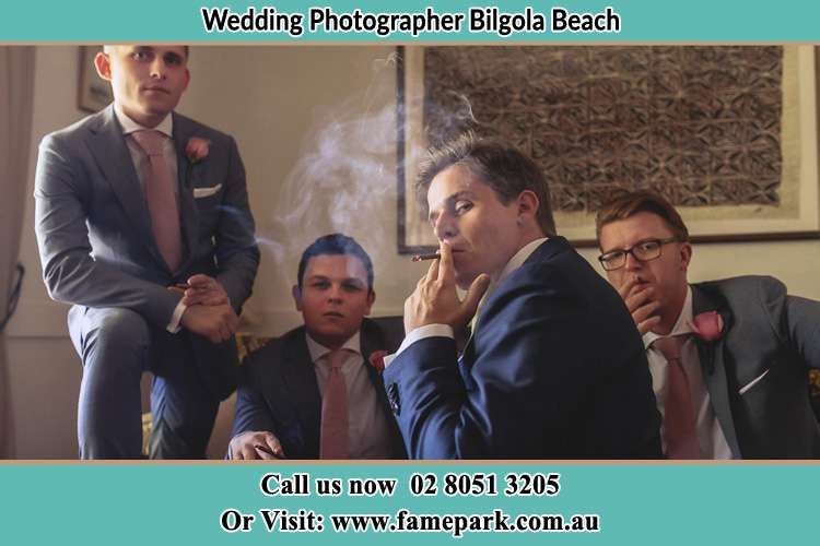 Photo of the Groom and the groomsmen relaxing Bilgola Beach NSW 2107