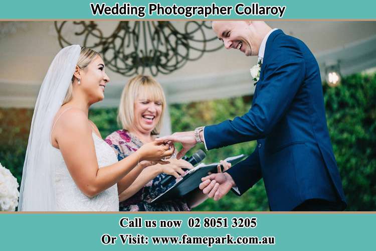 Photo of the Bride wearing ring to the Groom Collaroy NSW 2097