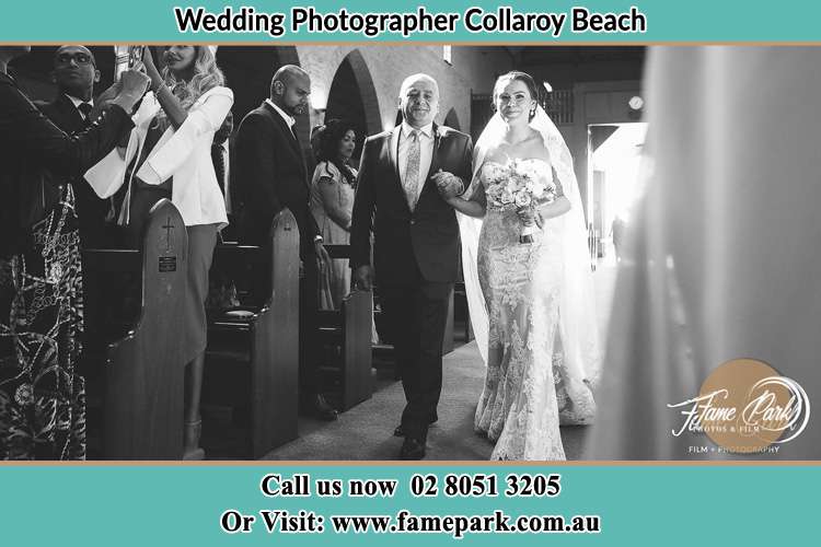 Photo of the Bride with her father walking the aisle Collaroy Beach NSW 2097