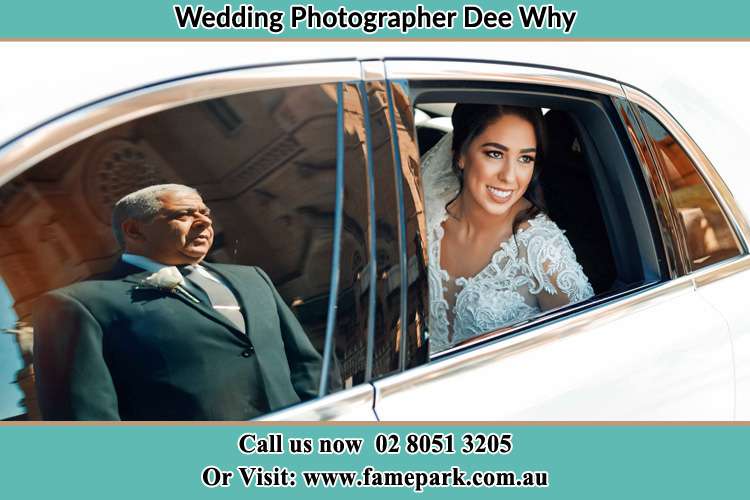 Photo of the Bride inside the bridal car with her father standing outside Dee Why NSW 2099