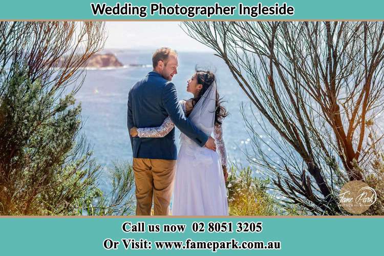 Photo of the Groom and the Bride looking each other near the sea front Ingleside NSW 2101