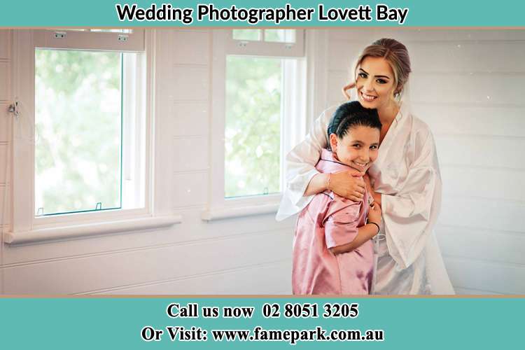 Photo of the Bride hugging the flower girl Lovett Bay NSW 2105