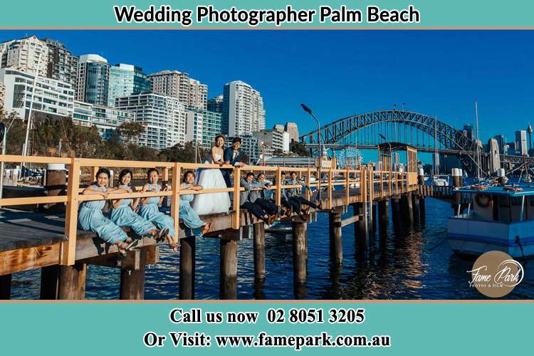 Photo of the Groom and the Bride with the entourage at the bridge Palm Beach NSW 2108