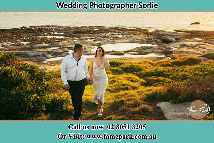 Photo of the Groom and the Bride walking near the lake Sorlie NSW 2086